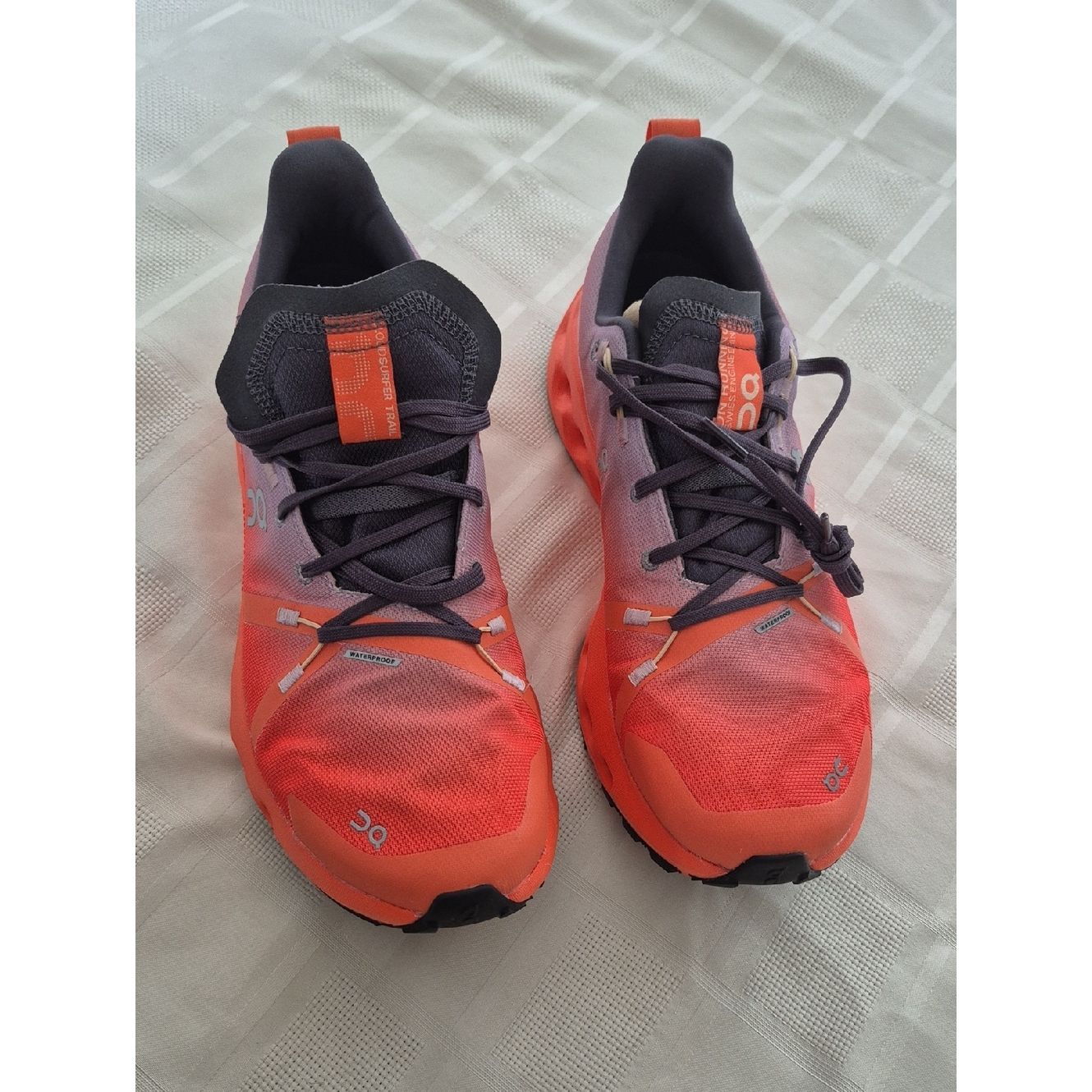 On Running Cloudsurfer Trail Red Shoes With Gray Logo